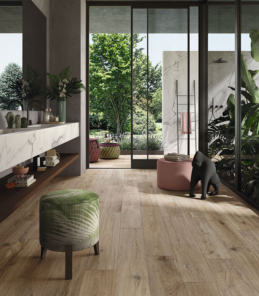 Bio Attitude Barrel enhances the bathroom with the warmth of wood-effect ceramics, paired with marble-effect surfaces for a natural, elegant and contemporary space.