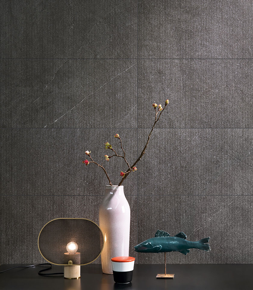 Nextone Dark Mark enhances the depth of dark stone with a refined decorative texture, ideal for elegant and contemporary wall coverings.